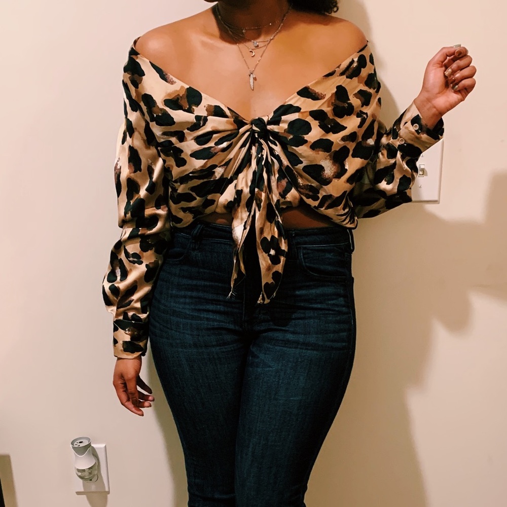 Chic boutique cheetah print wrap satin shirt. Size M